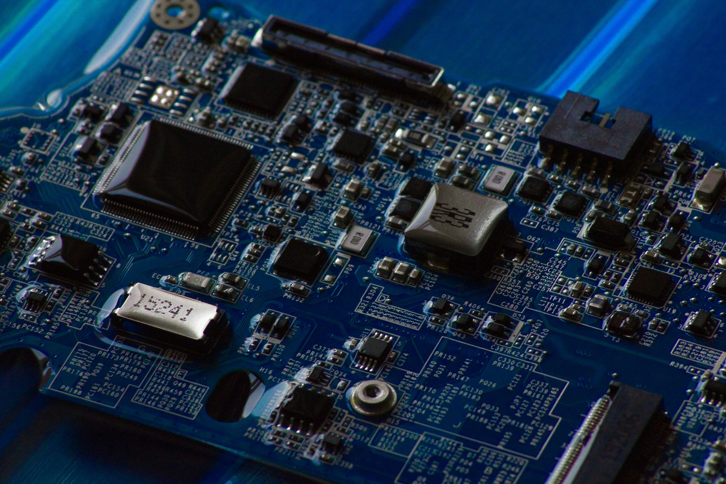 An onboard computer board with its processor and autopilot connector marked as a new behaviour is prepared for flight test